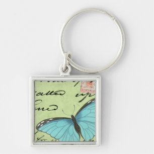 Llavero Mariposa de ala azul en postal Verde azulada