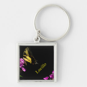 Llavero Mariposa de cola cruda tigre en Phlox en verano