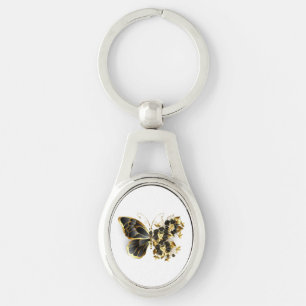 Llavero Mariposa de flor dorada con orquídea negra