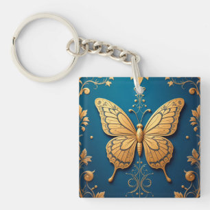 Llavero Mariposa Dorada Ornamentada Con Patrón Floral