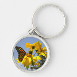 Llavero Mariposa monarca en la cadena de claves de girasol