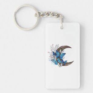 Llavero Mariposas azules sobre la media luna de madera