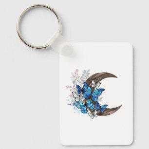 Llavero Mariposas azules sobre la media luna de madera