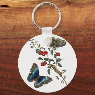 Llavero Mariposas azules y frutas rojas