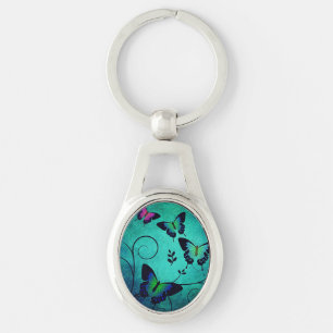 Llavero Mariposas de joyas ornamentadas azul teñido