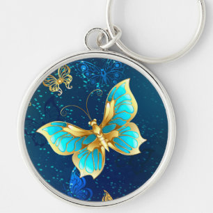 Llavero Mariposas doradas sobre fondo azul