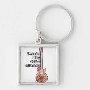 Llavero Me pregunto si mi guitarra me extraña.