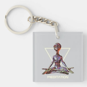 Llavero Meditación. Extranjero en posición tranquila