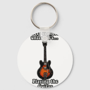 Llavero Menos es más a menos que toque guitarras