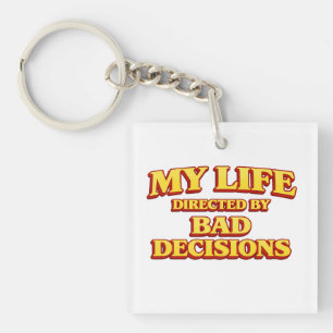 Llavero “Mi vida dirigida por malas decisiones” Diseño div