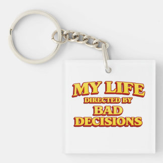 Llavero “Mi vida dirigida por malas decisiones” Diseño div