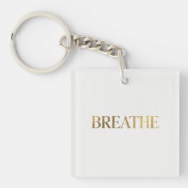 Llavero Minimalist typography with gold word breathe