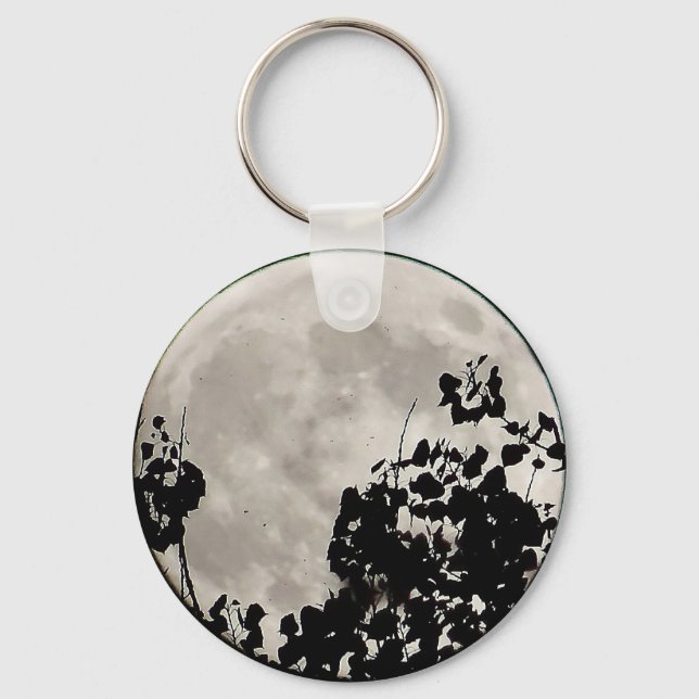 Llavero Moda detrás de hojas oscuras (Anverso)