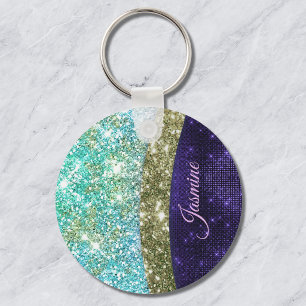 Llavero Moda monograma purpurina iridiscente azul morado