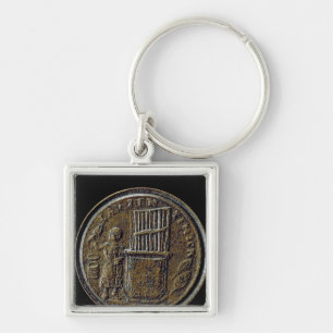Llavero Moneda romana que representa un órgano
