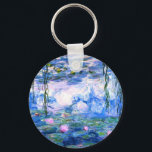 Llavero Monet Pink Water Lilies<br><div class="desc">A Monet pink water lilies button keychain featuring beautiful pink water lilies floating in a calm blue pond with lily pads. A great Monet gift for fans of impressionism and French art. Serene nature impressionism with lovely flowers and scenic pond landscape.</div>