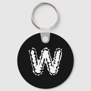 Llavero Monograma blanco espeluznante sobre negro