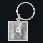 Llavero Monograma de acero inoxidable Faux Silver de lujo<br><div class="desc">Clásica Elegante Metálica De Acero Inoxidable De Lujo Plata Faux. Estas cadenas de claves se pueden personalizar para incluir su nombre inicial y su nombre de pila. Estas cadenas de claves hacen grandes favores de cumpleaños,  ducha de novia o fiesta de soltera.</div>