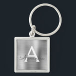 Llavero Monograma de acero inoxidable Faux Silver de lujo<br><div class="desc">Clásica Elegante Metálica De Acero Inoxidable De Lujo Plata Faux. Estas cadenas de claves se pueden personalizar para incluir su nombre inicial y su nombre de pila. Estas cadenas de claves hacen grandes favores de cumpleaños,  ducha de novia o fiesta de soltera.</div>