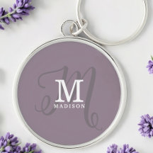 Monograma de caligrafía estiloso y nombre morado