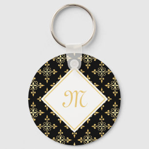 Llavero Monograma de lujo negro y dorado Quatre Floral