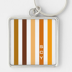 Llavero Monograma de rayas verticales naranja marrón claro