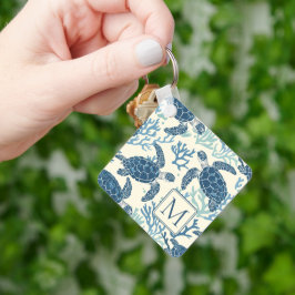 Llavero Monograma de tortugas azules y de crema