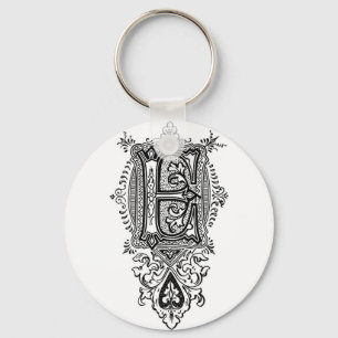 Llavero Monograma E de color negro floral vintage