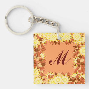 Llavero Monograma enmarcado con flores - cacao y amarillo