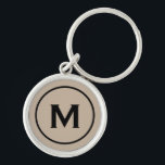 Llavero Monograma moderno de color beige mínimo<br><div class="desc">Personalizado Moderno Mínimo Monogramado Keychain Monograma Beige Inicial Negro. Perfecto como regalo de vacaciones,  favores de reunión familiar,  gracias a los padrinos y regalo para cualquier ocasión especial.</div>