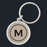 Llavero Monograma moderno de color beige mínimo<br><div class="desc">Personalizado Moderno Mínimo Monogramado Keychain Monograma Beige Inicial Negro. Perfecto como regalo de vacaciones,  favores de reunión familiar,  gracias a los padrinos y regalo para cualquier ocasión especial.</div>