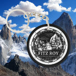 Llavero Monte Fitz Roy - Cerro Chaltén Sudamérica<br><div class="desc">Presentamos nuestra Black Round Keychain con un impresionante diseño blanco de Mount Fitz Roy enmarcado en un motivo de brújula. Este keychain es el accesorio perfecto para los amantes del aire libre y los aventureros. El detallado ilustracion del Monte Fitz Roy, encerrado en el marco de la brújula, captura la...</div>