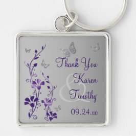 Llavero Morado, floral gris con cadena de mariposas