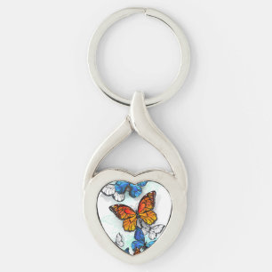 Llavero Morfo y monarca de las mariposas voladoras
