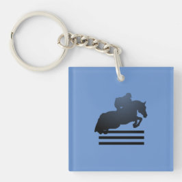 Llavero Mostrar saltador limpiando un obstáculo.