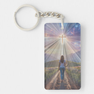 Llavero Mujer Caminando Hacia la Cruz Brillante – Viaje de