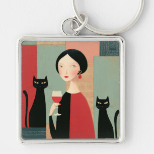 Llavero Mujer elegante gatos negros y vino