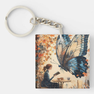 Llavero Mujer leyendo con arte abstracto de mariposa gigan