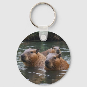 Llavero Nadando de capybaras en el río, 