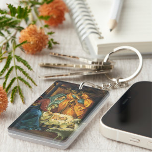 Llavero Natividad navideña vintage, el niño Jesús en el pe