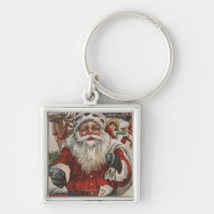 Llavero Navidad GreetingSanta con los ciervos y los niños