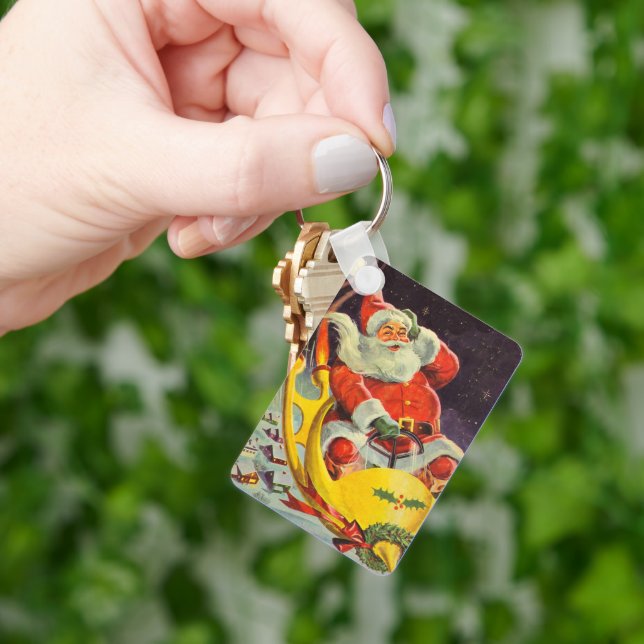 Llavero Navidad Retro, Santa Claus en una Nave Espacial (Mano)