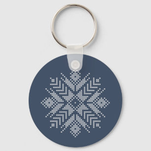 Llavero Navidades cruzan el diseño de copos de nieve