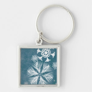 Llavero Navidades de copos de nieve azules y blancos