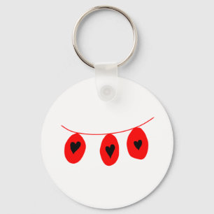Llavero navidades de la guirnalda negra rojas diseñan taza