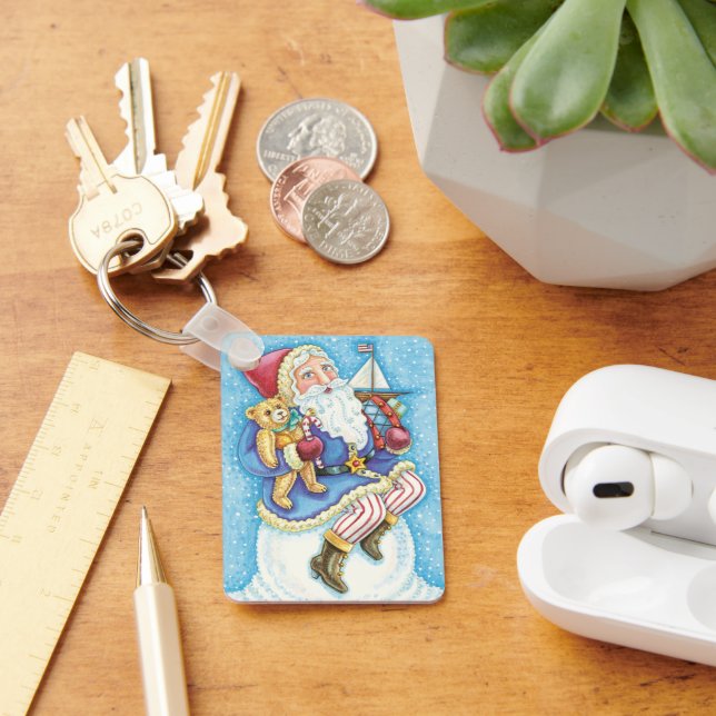Llavero Navidades, Santa Claus sobre bola de nieve con jug (Escritorio )