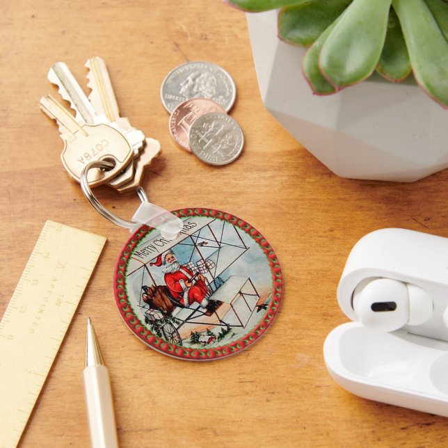 Llavero Navidades Santa volando un viejo avión (Escritorio )