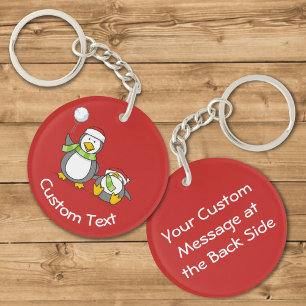 Llavero Navidades Snowballing Penguins Keychain