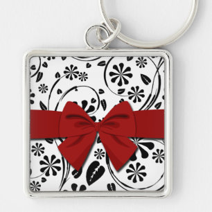 Llavero Negro en estampado de plores de la margarita