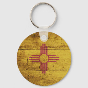 Llavero New Mexico State Flag on Old Wood Grain